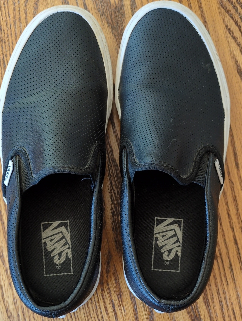 Vans Black Perforated Slip-On Sneakers with White Soles